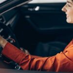 Woman sitting in her new car